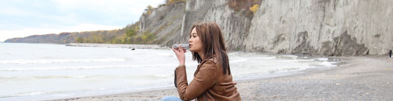 woman on the beach enjoying Firefly 2+